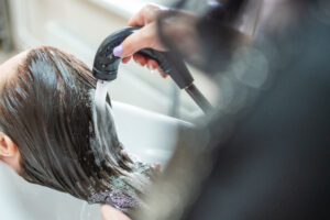 Image of someone getting their hair shampooed at Geca Med Spa